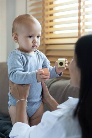 Pastelowe klocki interaktywne w woreczku Plan Toys