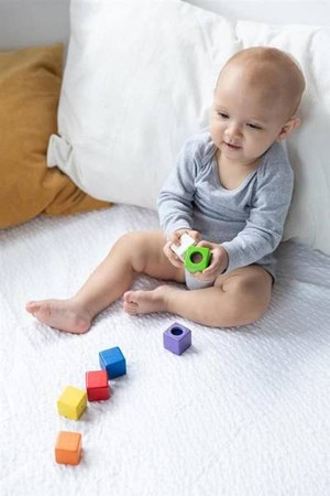 Klocki sensoryczne interaktywne w woreczku Plan Toys